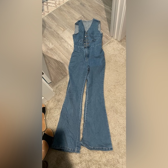 Jean sleeveless jumpsuit size Large. Zipper and buttons in front. - Picture 2 of 2